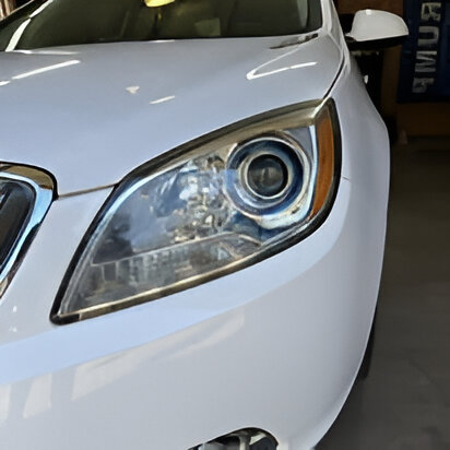 white 2015 Buick Verano headlight restoration before